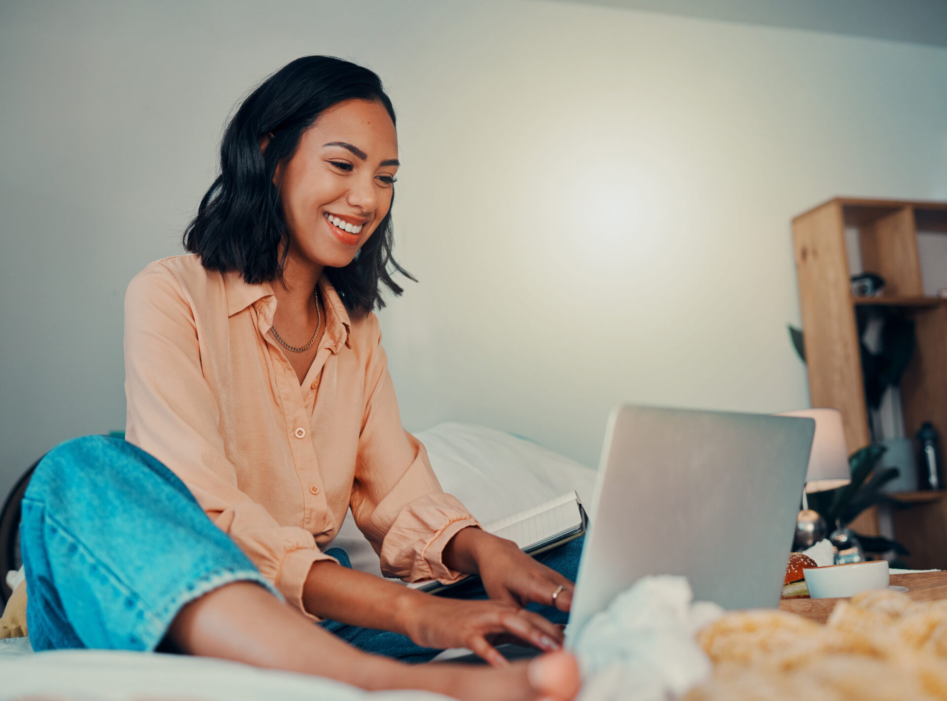 Female working, sat down alone in a house