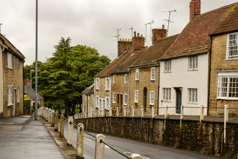 view of old houses and downhill street in the historic village