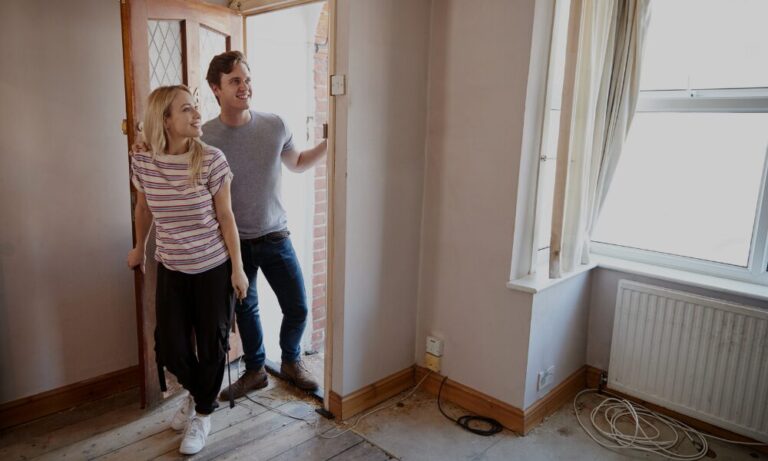 A couple viewing a rental property with an estate agent, representing landlords and tenants preparing for changes under the Renters’ Reform Act in Lichfield.