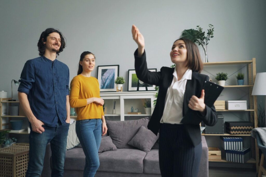 Estate agent showing a home to buyers in Skipton, Yorkshire