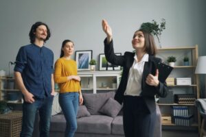 Estate agent showing a home to buyers in Skipton, Yorkshire