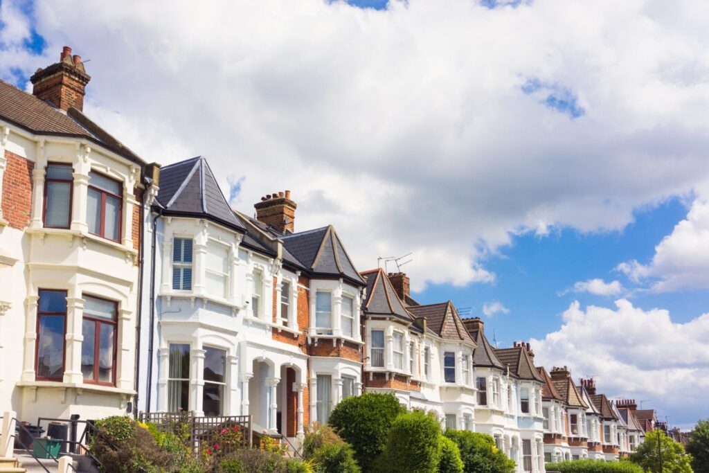 Row of Victorian terraced houses in Tamworth under a blue sky, close to the newly opened Town Hall Place town centre hub