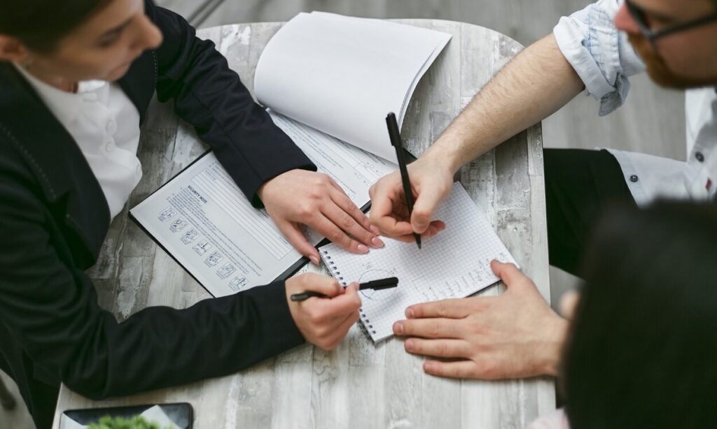 Landlords reviewing rental yield calculations and property investment plans