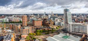 Leeds South Bank skyline in 2026 showing Aire Park, modern waterfront apartments and LS10 city centre developments.