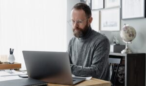 Landlord reviewing tenant application documents with letting agent