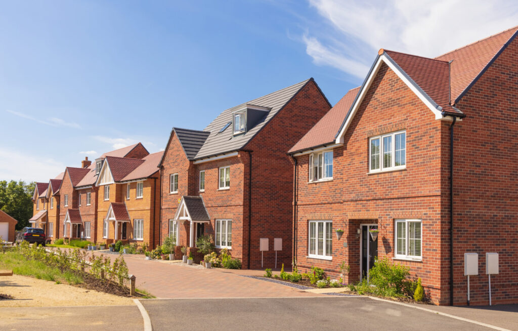Modern red-brick detached houses in a new residential development in Skipton, reflecting rising property values and demand for spacious homes in 2026