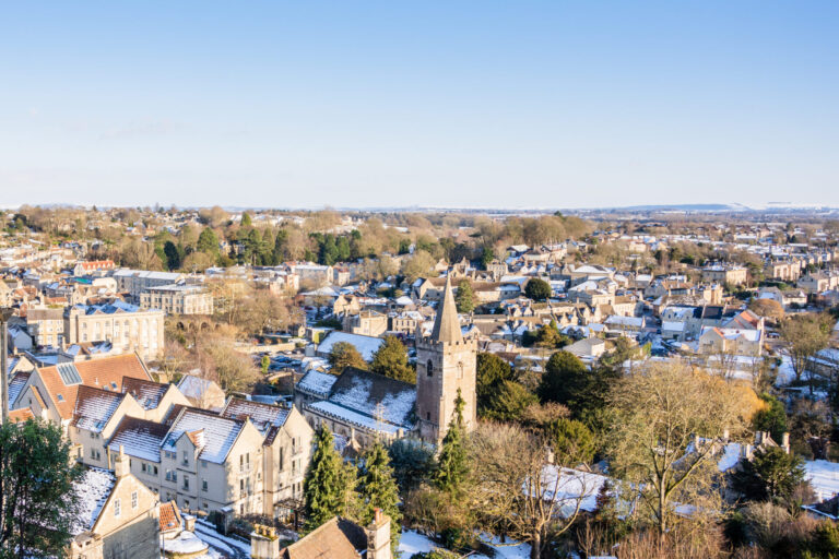 Panoramic view of Bradford skyline with residential homes and historic architecture at sunset