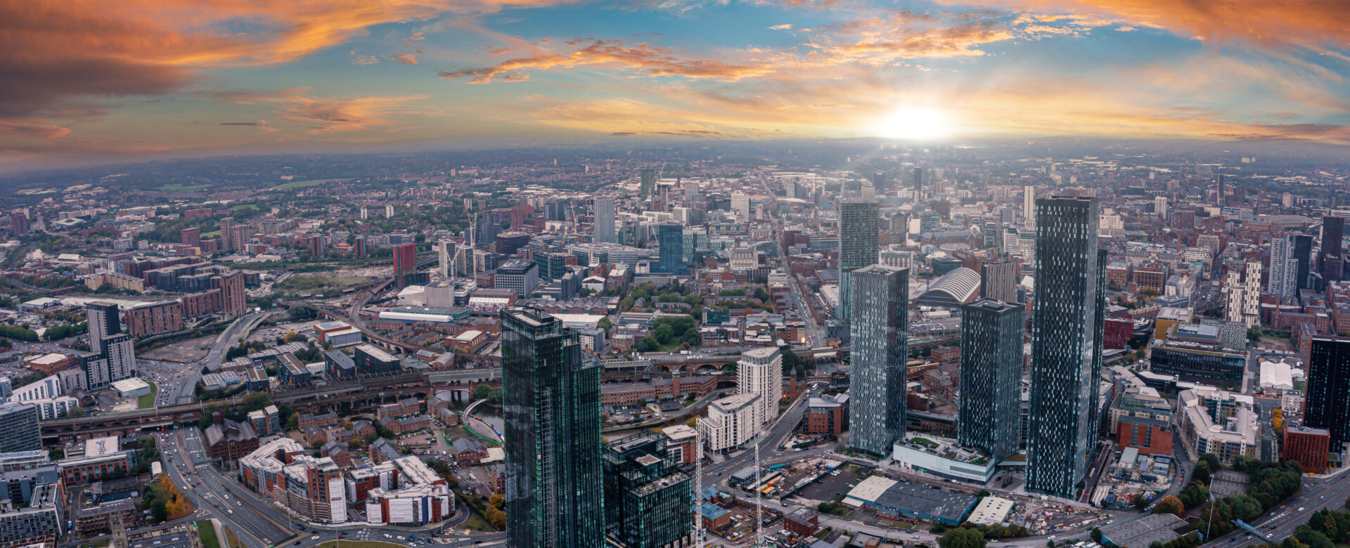 Aerial skyline view of Ancoats and Manchester city centre showing modern developments and urban living