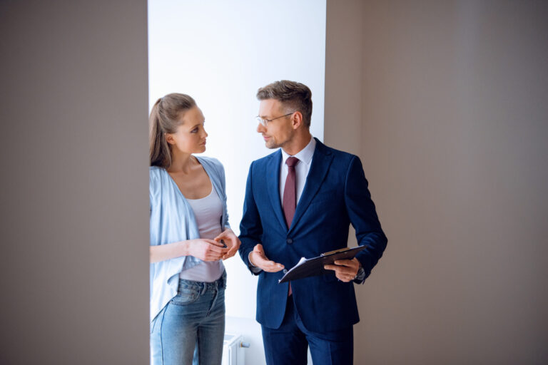 estate agent discussing property details with buyer in Carlisle home viewing