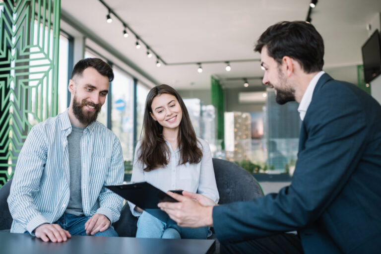 Estate agent discussing Gravesend property prices and buying opportunities with a couple