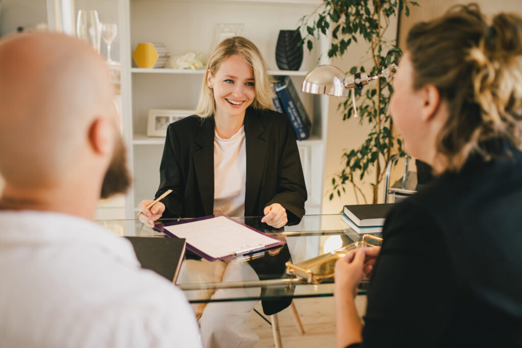 Letting agent advising clients in a home, representing Harborne rental market demand and landlord opportunities in Birmingham.
