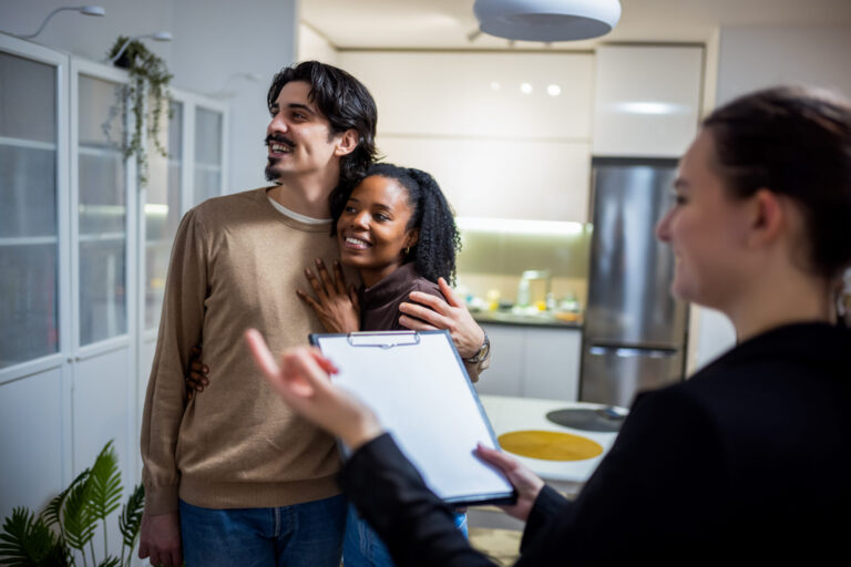 Letting agent showing a rental property to a couple, representing professional lettings support and tenant demand in Consett.