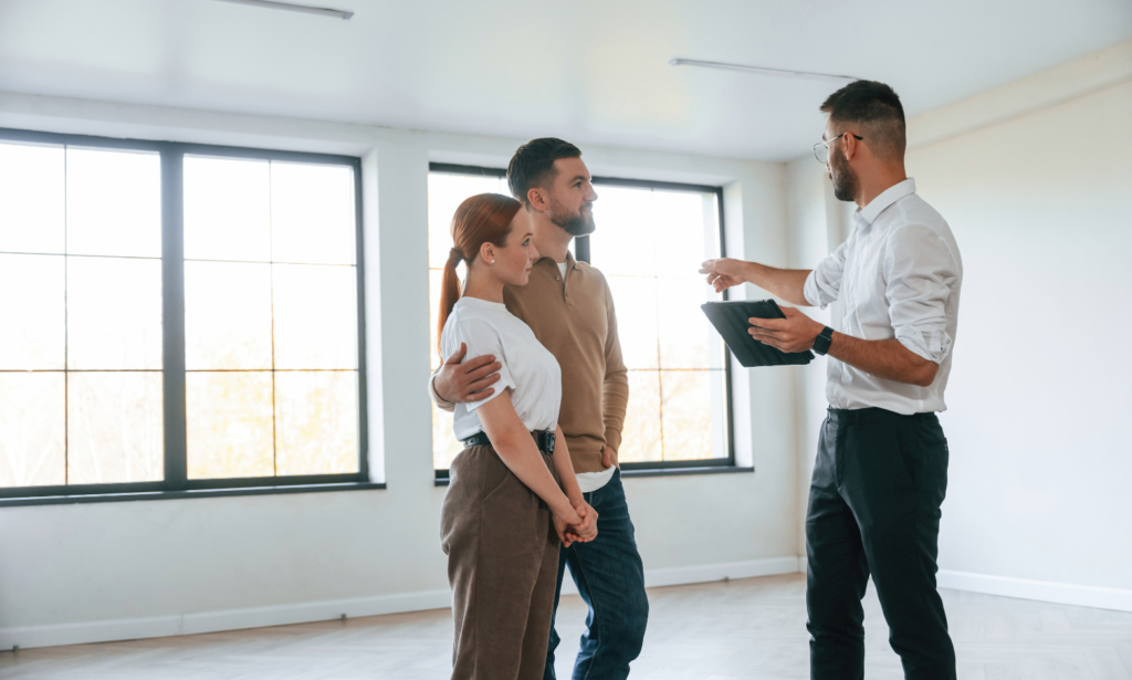 Solihull property agent showing a rental home to prospective landlords
