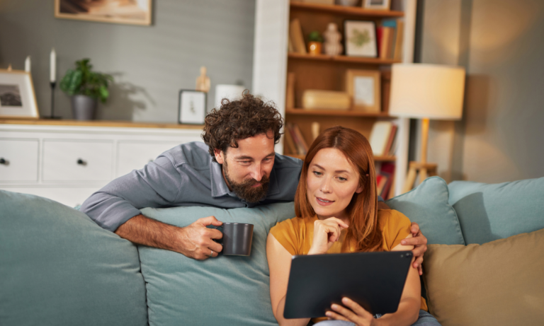 Exeter landlords reviewing rental property guidance on a tablet