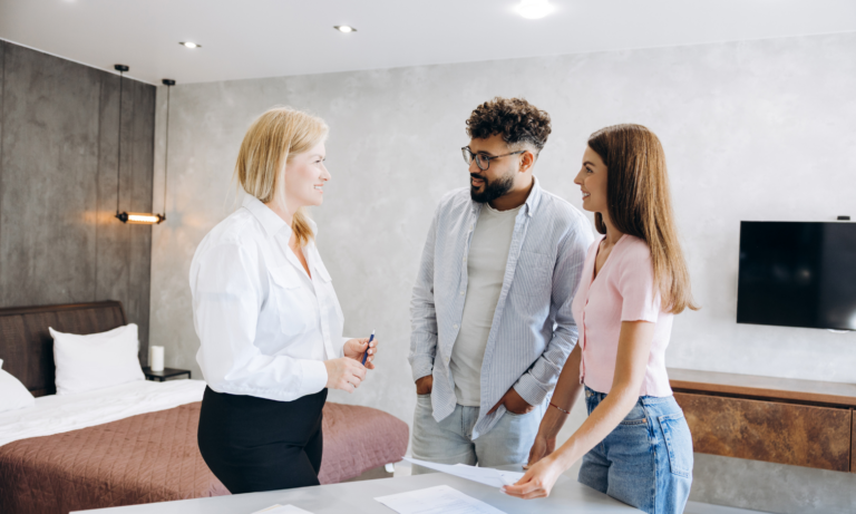 Lichfield letting agent discussing a rental property with landlords
