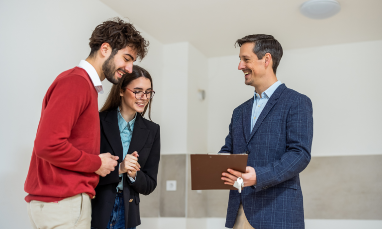 Couple viewing a property with an estate agent while looking to buy a home in the Yorkshire Dales.