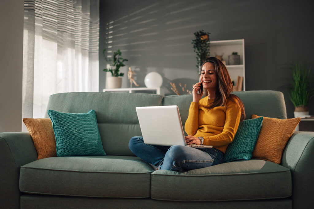 First-time buyer researching homes in Southampton while speaking to an estate agent on the phone.