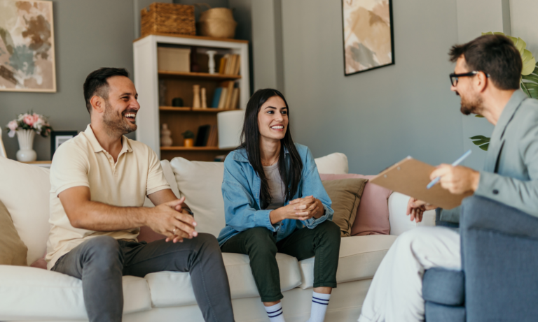 Landlords discussing rental property opportunities with a letting agent