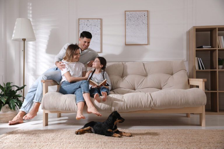 Family relaxing together in a bright living room, representing a settled rental home and tenancy in York.