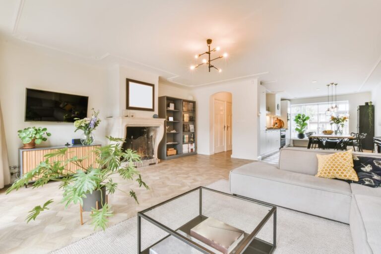 Light open-plan living room with fireplace and dining area in a Harborne, Birmingham rental home